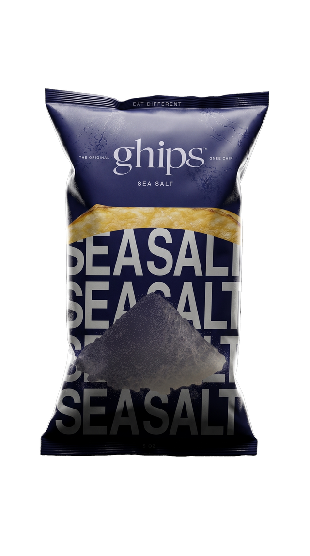 Ghips Sea Salt ghee potato chips in a navy stand-up bag, with a mound of coarse sea salt in front